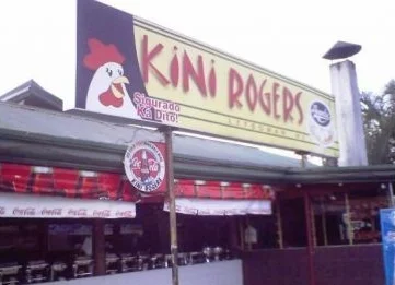 Sign displays: "Kini Rogers"