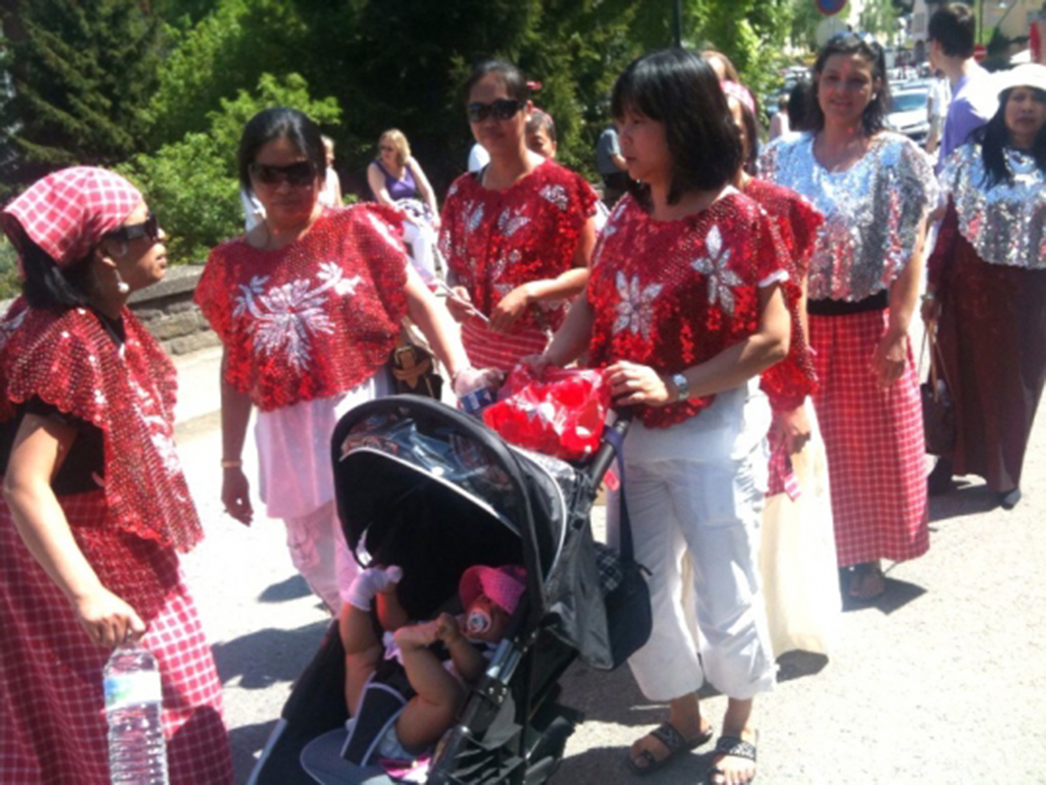 ​The Filipino organization Samahan Luxembourg joins the parade at the 62nd Geenzefest, a Pentecost festival in Wiltz, Luxembourg. (mnnetherlands.com)