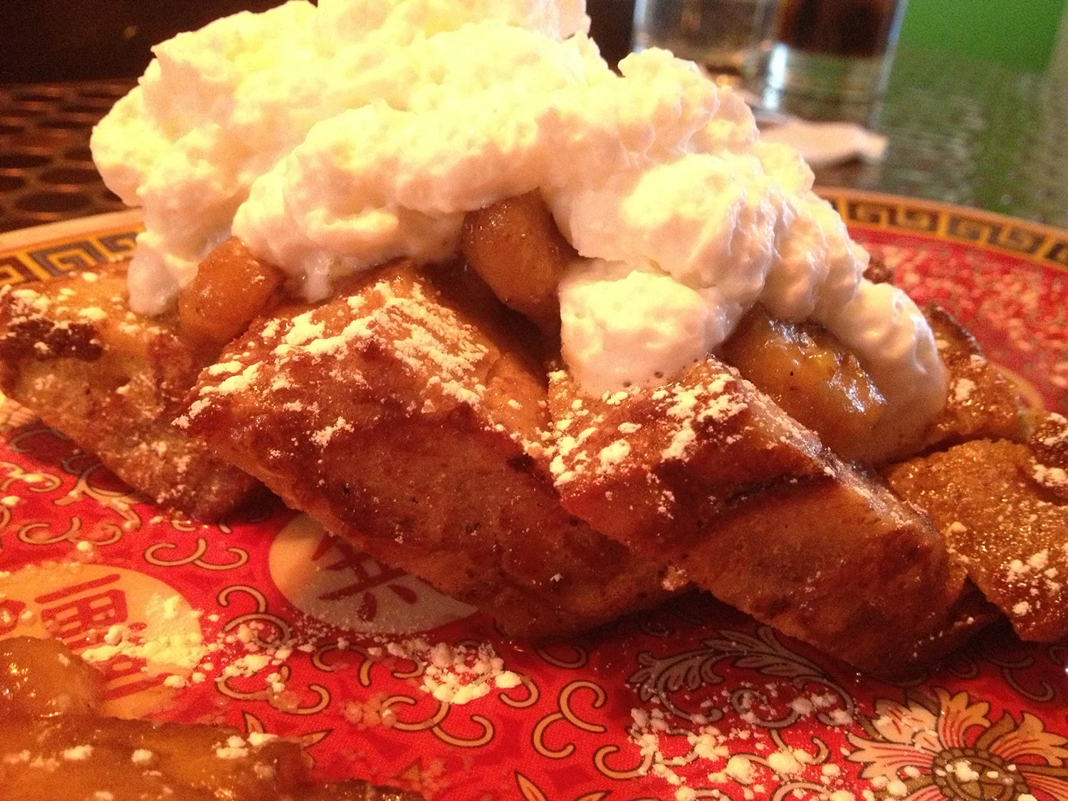 Pig and Khao's Pain Perdu, which made of sweet banana slices, bread pudding, coconut whipped cream and genesee cream syrup (Photo by Elizabeth Ann Quirino)