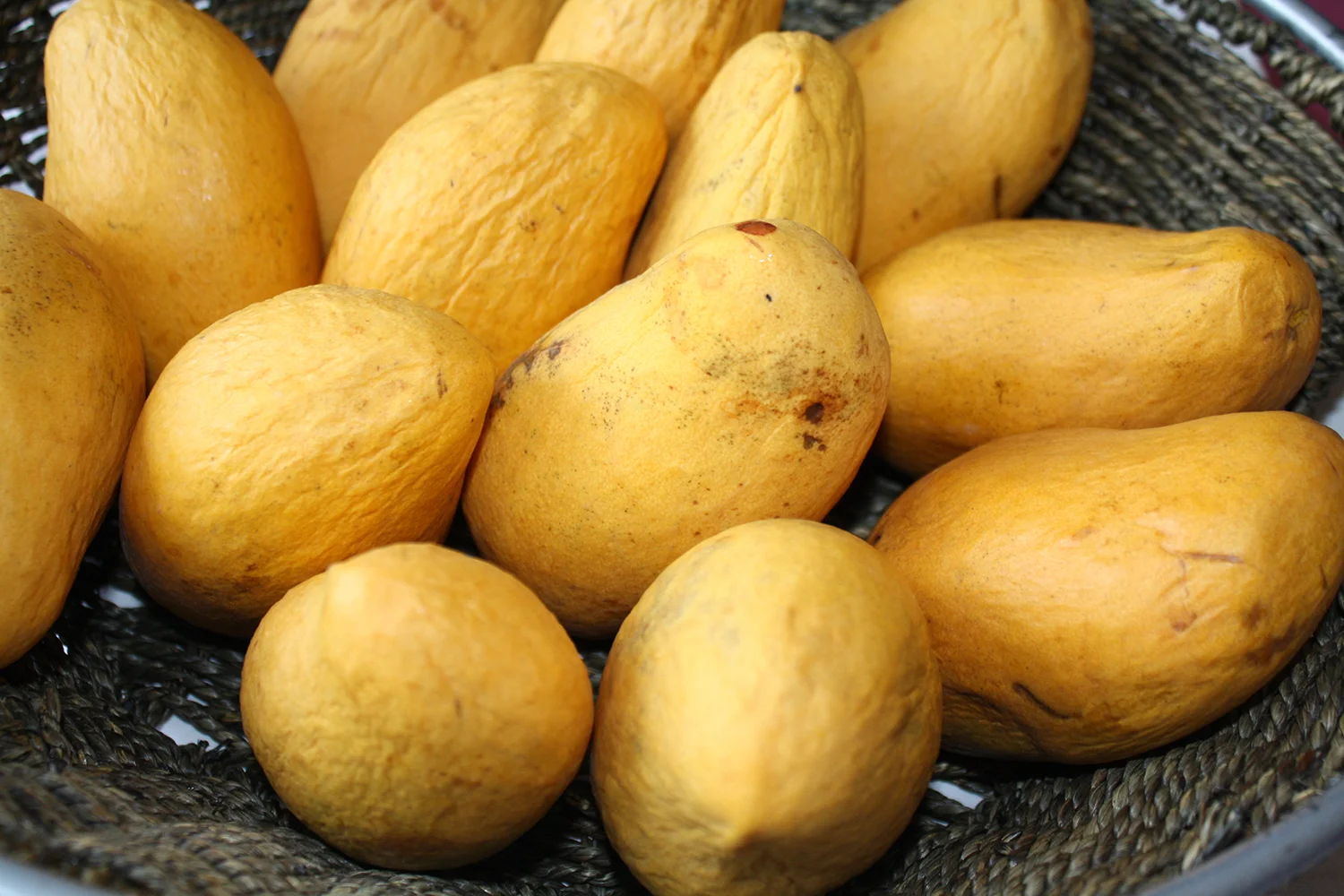 Mangoes in a basket (Photo by Elizabeth Ann Quirino)