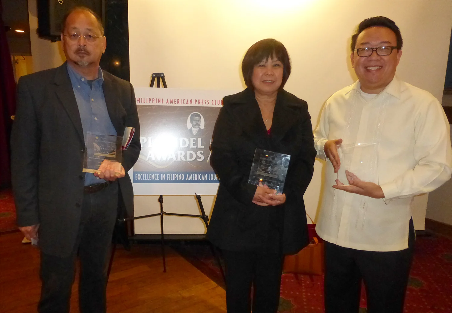 Positively Filipino's Rene Ciria-Cruz, Gemma Nemenzo and Raymond Virata accept the 2013 Plaridel Awards on behalf of winners Lotis Key, Francis Calpotura and Elizabeth Ann Quirino. (Photo by I. Wilfredo Ver)