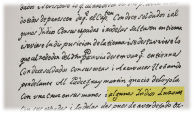 The English translation of the sentence reads: “I landed with twelve soldiers, with Loyola carrying a cross in his hands, preceding with some Luzon Indians, with their swords and targets.”