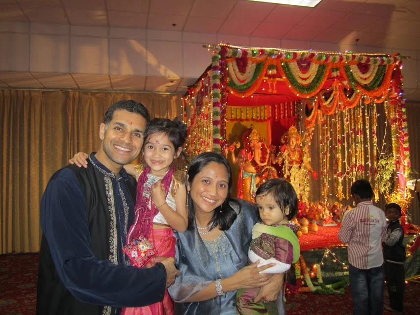 Our family at the temple for Diwali, the festival of lights. Teaching the kids about the shared lessons of "good over evil" embraced by both their parent's religions. (Photo courtesy of Regina Manzana-Sawhney)