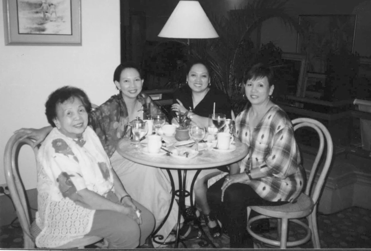 Leny Strobel (second from left) says family members not directly involved in caring for their aging parents are prone to more stress. With her mother Esperanza and sisters Millie (right) and Roxie. (Source: Filipinas Magazine, September 2004)