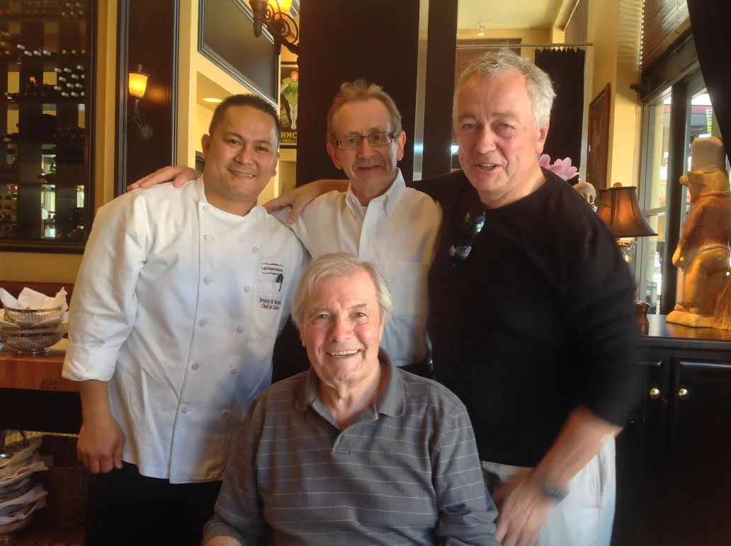 Brendy Monsada, left, with Master Chefs from France, Chef Joël Guillon, Chef Roland Passot and Chef Jacques Pepin (foreground center). Chef Brendy orchestrated Jacques Pepin’s 75th birthday at Left Bank Menlo Park. (Photo courtesy of Brendy Monsada)