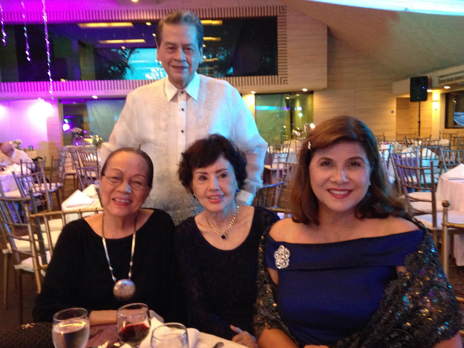 Caridad Sanchez (left) today with (L-R) Delia Razon, Imelda Ilanan, and Pepito Rodriguez (standing) at the Anson Roa-Rodrigo wedding in June (Photo courtesy of Cathy S. Babao)