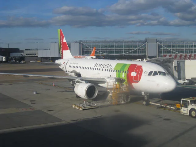 TAP Portugal is the equivalent of PAL in Portugal. This plane is parked at London's Gatwick airport and is about to leave to the Portuguese capital, Lisbon. The UK is now the leading destination of Portuguese migration. (Photo by Tiago Gutierrez Marques
