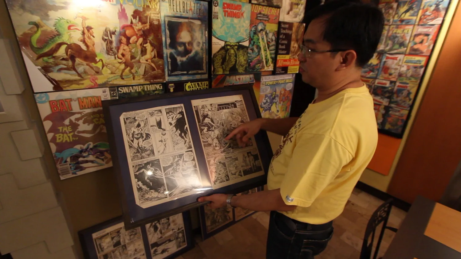 Alfredo Alcala, Jr. showing the works of his famous dad (Photo courtesy of Pepper Marcelo)