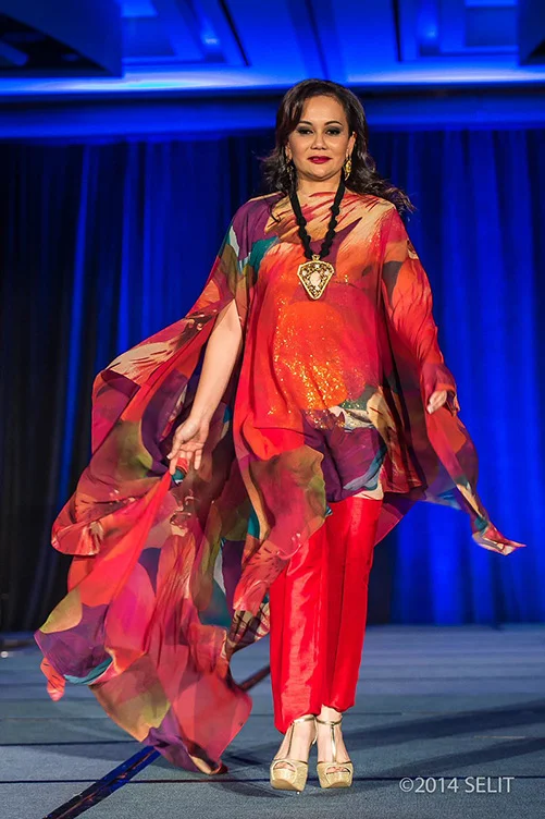 Multi-color floral print kaftan top and gold camisole paired with crimson straight-legged pants (Photo by Selit Rapadas / UNIT ONE Photography Studio )