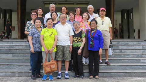 Outside the Presidential Palace. Ken Kashiwahara (front, middle) and Thuan Trinh (front row right) (Photo courtesy of Ken Kashiwahara)