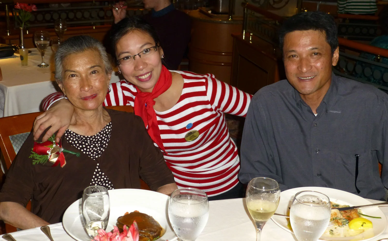 The lady in the sailor stripes is&nbsp;Gilen Valle Bunal from Talisay, Cebu.&nbsp; She is part of the crew&nbsp;of the Island Princess and has been working the cruise lines for several years.&nbsp; She graciously fed us with a cheerfulness and warmth that belied her sadness in missing her young daughter all the days at sea. (Photo by Albert Romero)