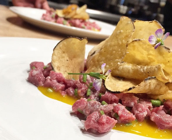 Beef tartare, salt and vinegar taro chips, and marinated egg yolk (Photo courtesy of LASA Restaurant Project)