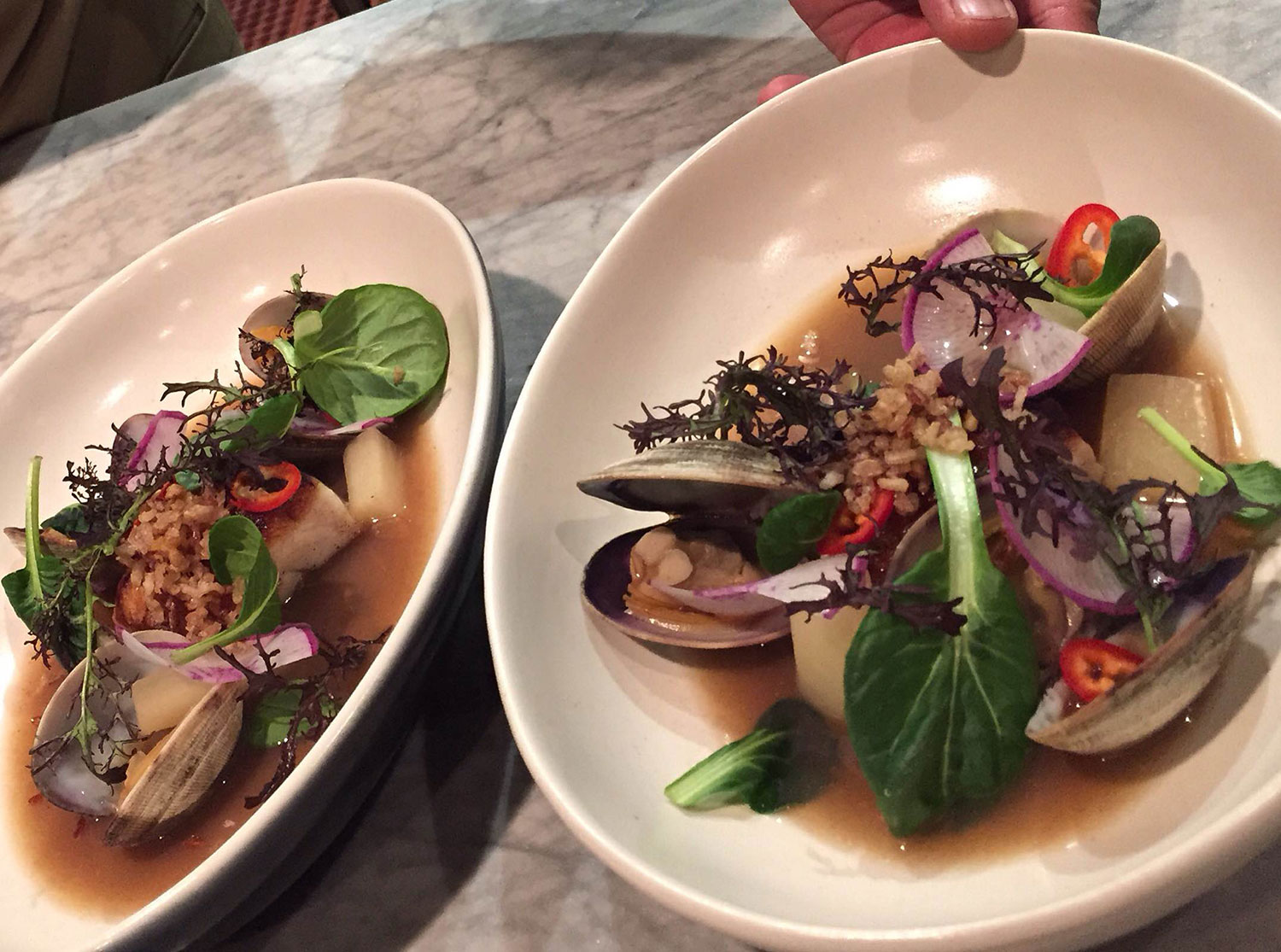 Red grouper and Manila clams, braised daikon, tamarind dashi, baby tatsoi, and Fresno chili (Photo courtesy of LASA Restaurant Project)
