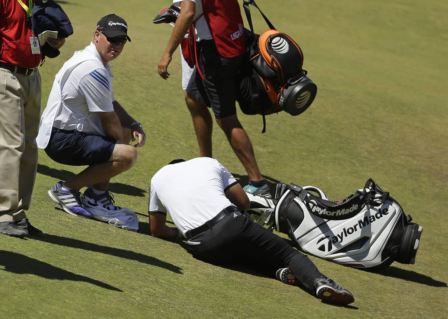 Caddie Colin Swatton looked after Day as he succumbed to vertigo at the U.S. Open earlier this year. (Source: Associated Press)