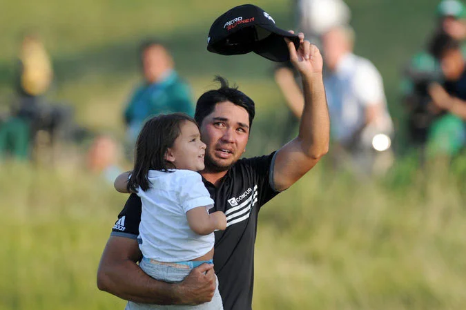 With son Dash, Day got emotional upon winning his first golf major at the 2015 PGA Championship, after years of top 10 finishes. (Source: Reuters/Photo by Thomas J. Russo)