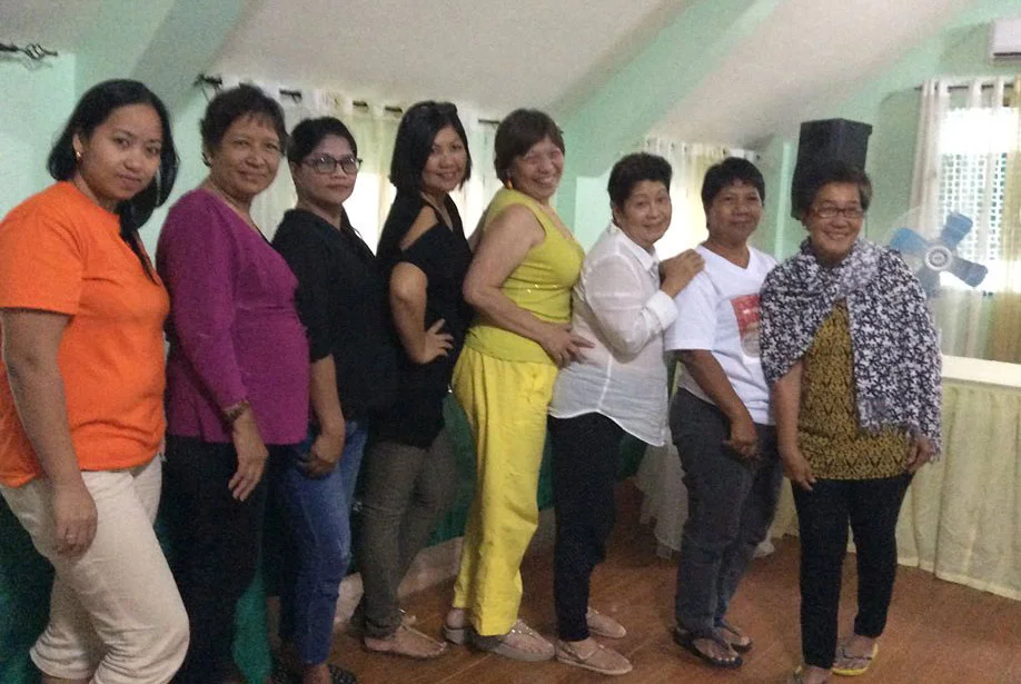 Dr. Margarita Holmes (fourth from right) with Typhoon Haiyan survivors during a recent two day psychosocial activity (Photo courtesy of WeDpro)