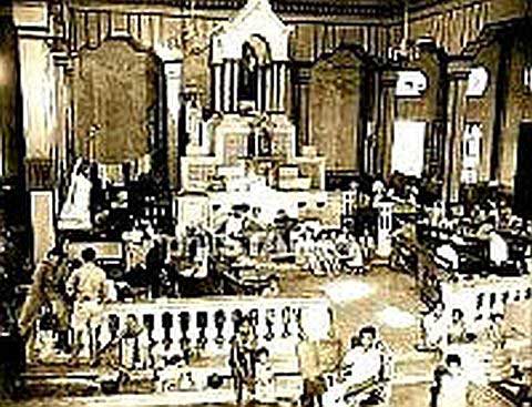 Singalong Church where we were liberated by elements of US 37th Division on Feb. 12, 1945. This photo was taken 2 weeks later, as the church filled up with people whose homes had been destroyed.