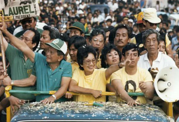 Doy Laurel and Cory Aquino hit the campaign trail to oppose President Marcos (Photo by Erik de Castro/Reuters/Corbis)