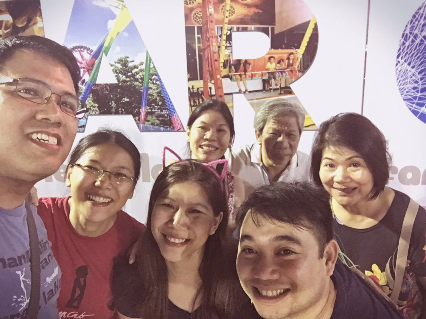 Reina (second from left) with Gary (left), her two sisters, brother-in-law and parents (Photo by Gary Coronado)