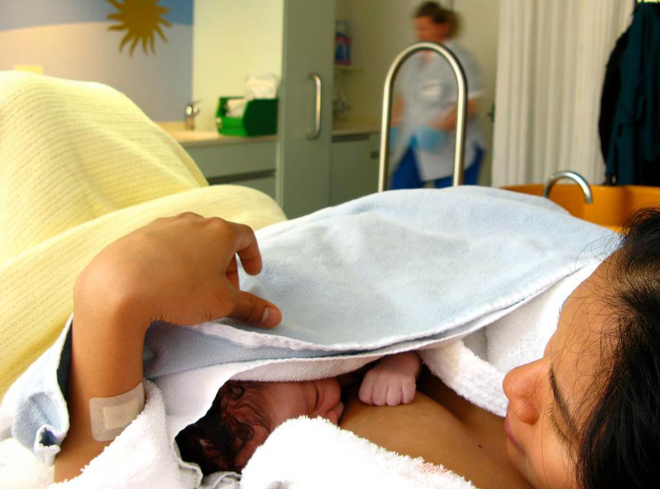 As a rule, the doctors and midwives are not allowed to take the baby from the parents' sight, if there are any additional assessments to be accomplished outside of the delivery room, the husband must come along, otherwise the baby is placed on the breast immediately after birth to latch-on while the cord is being cut or the placenta being delivered. (Photo courtesy of Cherry Malonzo)