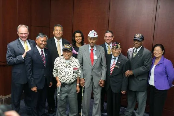 Jesse Baltazar, sixth from the left, at the introduction of the 2015 Filipino Veterans Congressional Gold Medal Act (Source: Huffington Post)