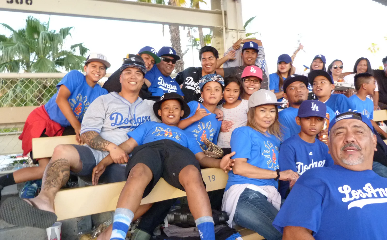 Filipino fans jump in for a photo opportunity during this year's LA Dodgers' Filipino Night (Photo by Anthony Maddela)