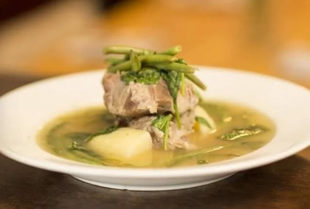 Purple Patch D.C. serves its own style of Sinigang (Tamarind Stew) and the sour, tangy flavors do not disappoint. (Photo courtesy of Purple Patch D.C.)