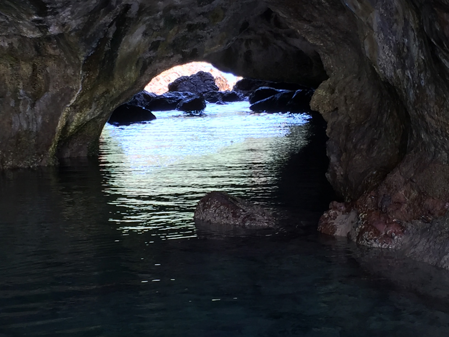 Cave at the base of Dicasalarin Point. (Photo by Omar Paz)