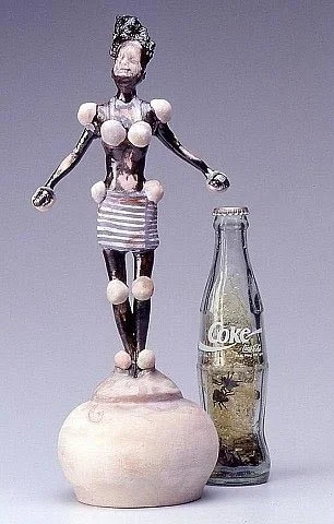 Self-identified as an American Filipino artist, Poethig hybridizes imagery from both cultures as in Kayumanggi , above, from her 1996 Babaylan Barbie series. ( Photo © Johanna Poethig)