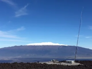 The silver suitcase is part of equipment used by scientists at the Mauna Loa Observatory in Hawaii. The samples have been recording CO2 levels since 1958, creating the longest-running data set in the world, and an important tool to understanding climate change. (Photo courtesy of Aidan Colton.)
