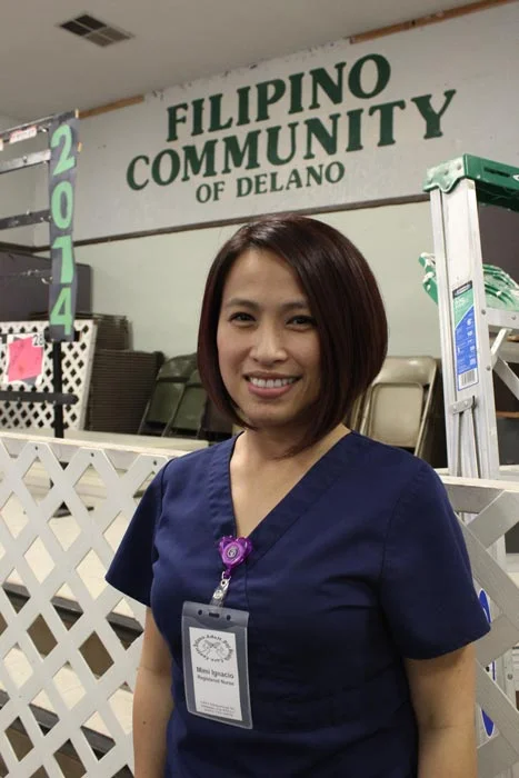 Mimi Ignacio, a nurse at the Filipino Community Center in Delano, California. She worked in the fields as a teenager and now serves the elder Filipinos in the area that go to the Center, a historic location in the city. (Photo by Dorian Merina)