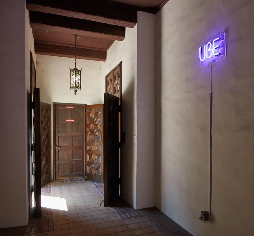 The UBE neon sign announces the celebrity status of the lowly root in the corridor entrance to the Mills Art Museum. “SOMA Pilipinas will be the new Filipino corridor—an ube corridor,” France noted. (Photo by © Phil Bond)