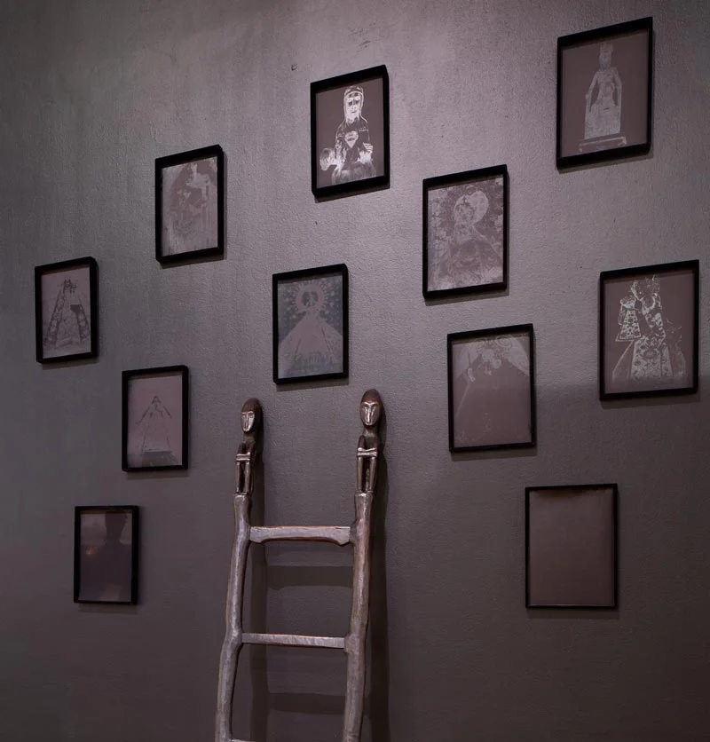 Exploring Sacred Art archetypes, France created black-‐on -‐black portraits of Black Madonnas, including Ermita’s Nuestra Señora de Guia, Naga’s “Ina” and Antipolo’s Our Lady of Peace and Good Voyage and grouped them with an Ifugao bulul ladder. (Photo by © Phil Bond)