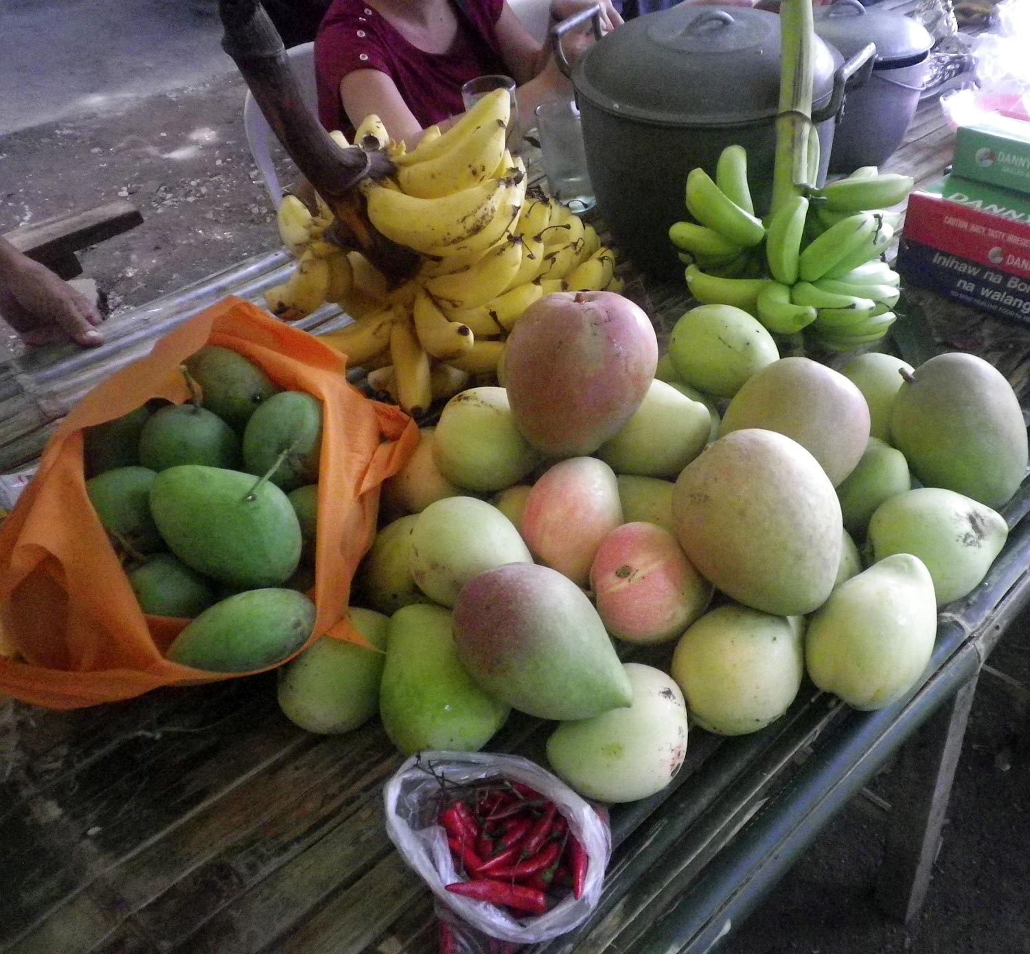 The fertile earth of Cupang continues to yield so many kinds of fruits and vegetables: several varieties of sweet mango and bananas all-year round, and tons of chico in December and January. Over the years, many of the orchards have been displaced by subdivisions, resorts and factories. (Photo by Ed Maranan)