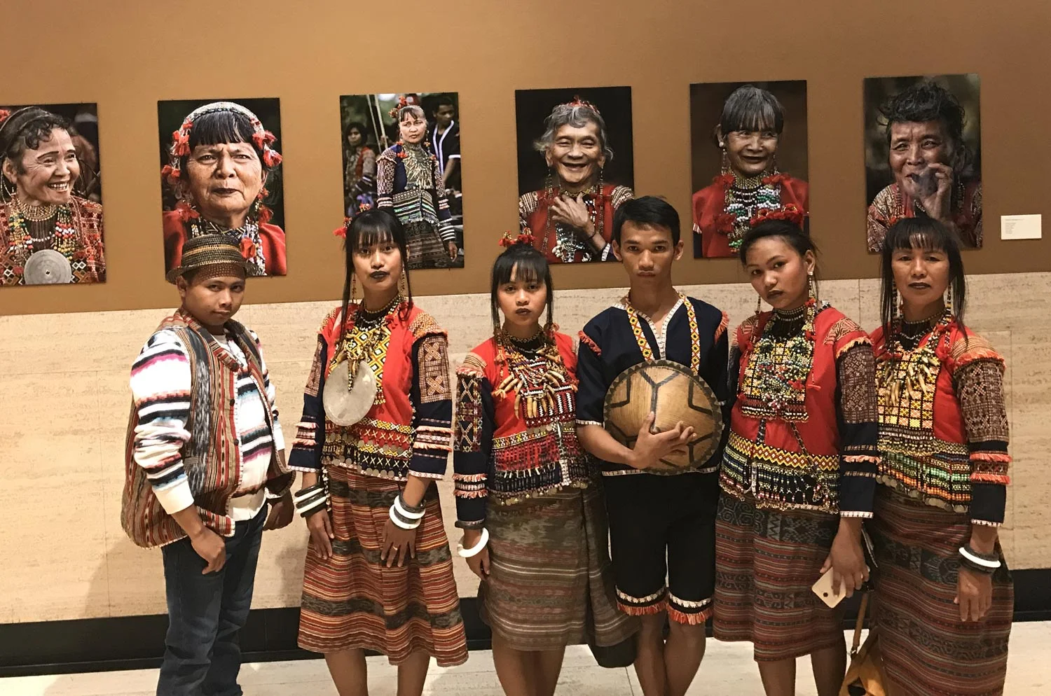 L-R Benjie, Christine, Mary Joy, Joe Mar, Rose Ann, Nita in front of their Mandaya elders’ portraits (Photo by Michael Gonzalez)