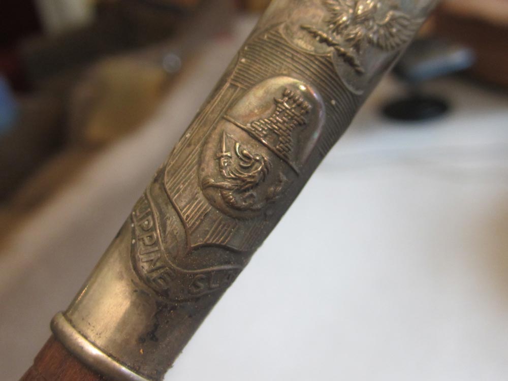 The Philippine coat-of-arms on Quezon's "swagger stick" (Photo courtesy of Titchie Carandang-Tiongson and Erwin R. Tiongson)
