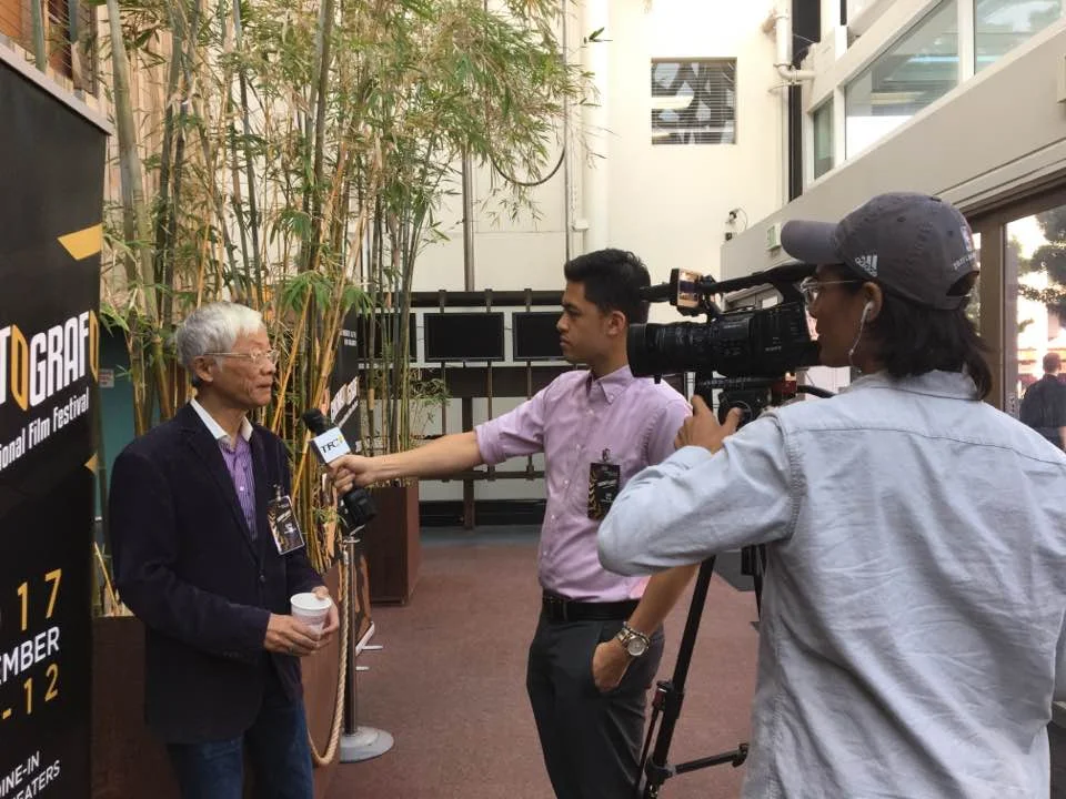 San Francisco Arts Commissioner At Large Gregory Chew (left) being interviewed by the BA team said “We’re always invisible, especially when it comes to mainstream media. We have to tell our stories.” (Photo courtesy of Pia Lopezbanos-Carrion)