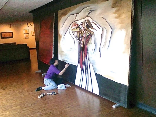 Retouching a mural by Jaime de Guzman from the CCP Collection copy