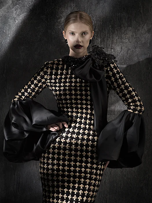 What do you say about velvet and leather weaved together creating an edgy yet soft finish with oversized sleeve end details?