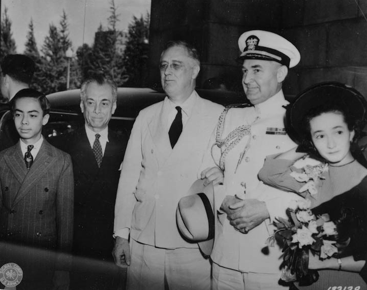 (From left to right) Manuel Quezon, Jr., Philippine President Manuel Quezon, U.S. President Franklin D. Roosevelt, Captain John McCrea, and Maria Aurora Quezon upon the arrival of President Quezon's party to Washington, D.C. May 13, 1942.  …