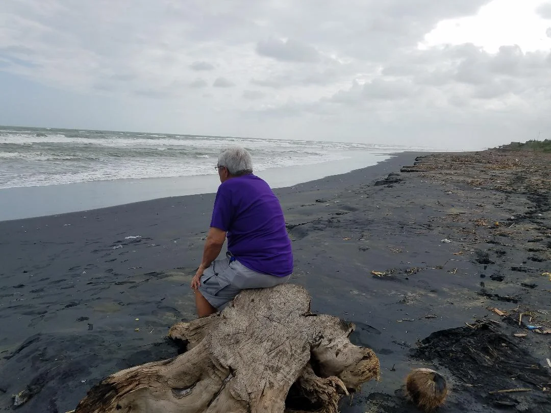 My father communes with the West Philippine Sea, of which its salty breeze my grandfather breathed in Ballesteros 100 years before. (Photo courtesy of David R. Rabaja)