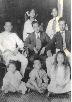 Eight of the nine children of Felipe and Leocadia Tempongko (first row, left to right), Lydia, Oscar, Sarah; (second row, left to right), Carlos, Umberto, Fernando; (top row), Esther and Ernesto. Missing from the photo is Antonio.
