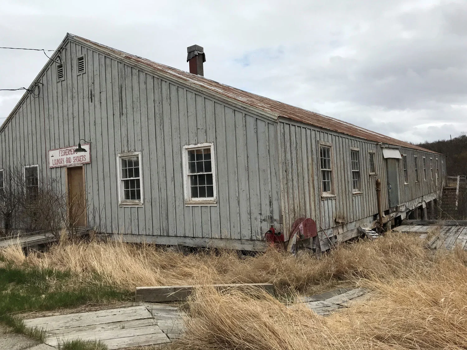 The Mess Hall where Filipinos and Native cannery workers ate. This building reflected the discriminatory policy prevalent in Alaska’s salmon canneries. With the passage of the EEO Act of 1972, the Alaska Packers Association (APA) established Affirmative Action Standard Procedures that set goals in hiring minorities and women and desegregating the mess hall. After the new Mess Hall was integrated, the old Mess Hall was converted into storage, cooks' quarters and a laundry for fishermen. (Photo courtesy of Katherine Ringsmuth, 2018)