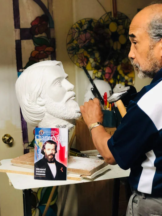 Mogi chisels bust of Blessed Frederic Ozanam, founder of Society of St. Vincent de Paul. (Photo by Marisa S. Roque)
