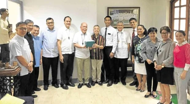 Bishop David, Archbishop Valles, Jose, Ordinario (center) and other CBCP and Mormon officials (Source: inquirer.net)