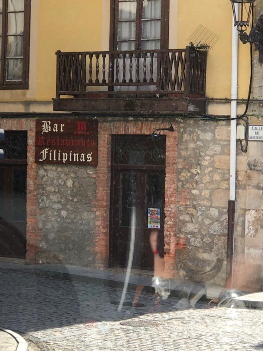 Four centuries later, King Philip II’s brand lives on in businesses that may or may not have anything to do with the country named after him, such as this restaurant in Comillas.  (Photo by Cherie M. Querol Moreno)