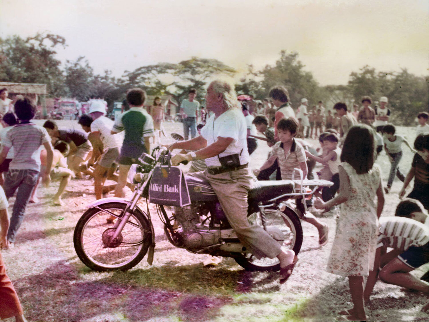 Climaco on his trusty motorbike (Photo by Robert Lim)