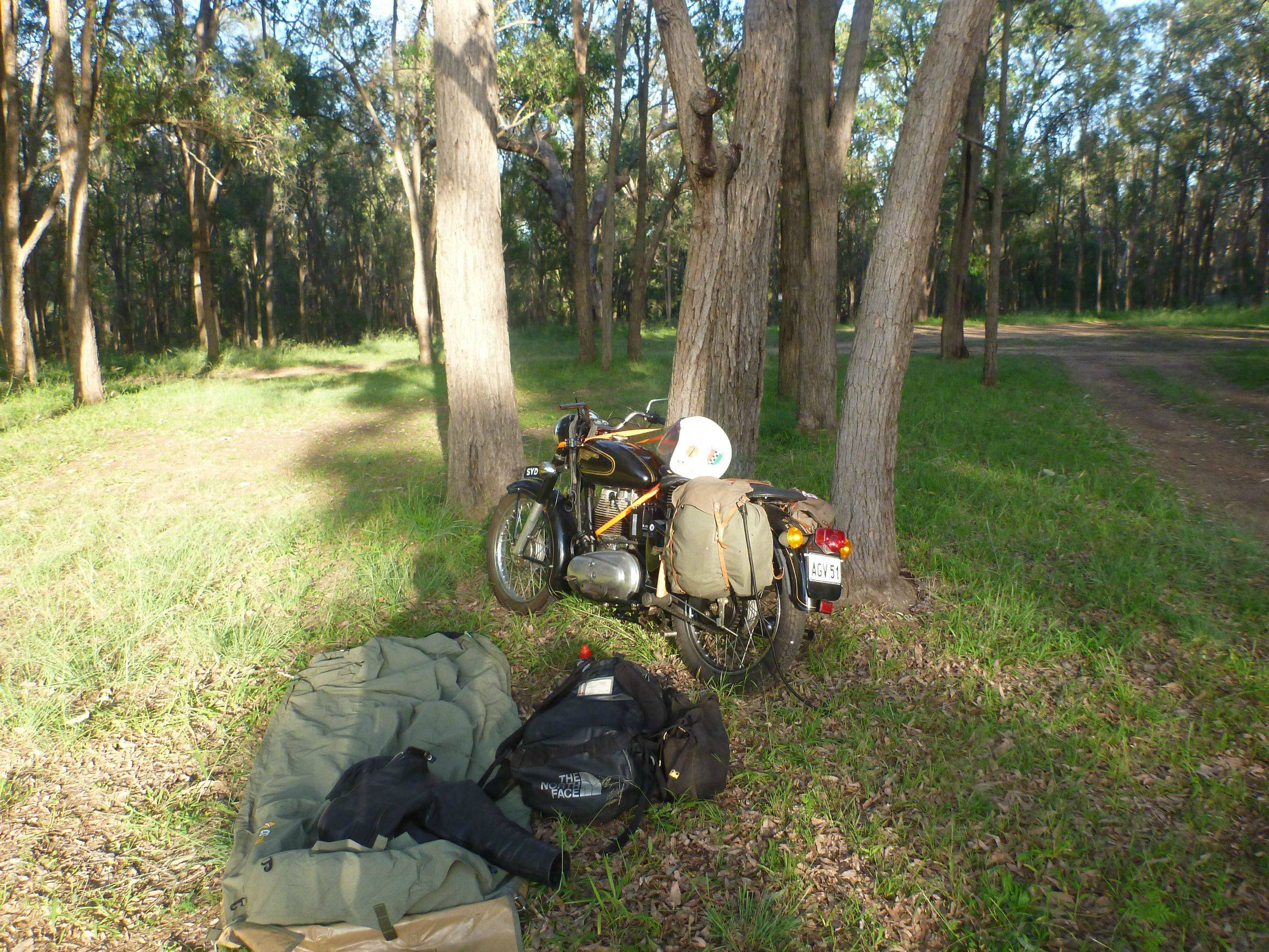After the bike fell over due to the soft ground I strapped to a tree while unloading