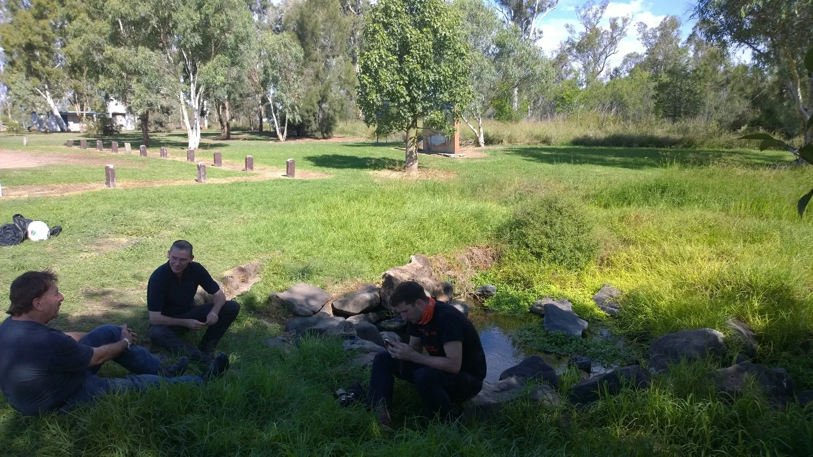 Resting at Ban Ban Springs with Trevor Gibson, Dave Dri and a local rider.