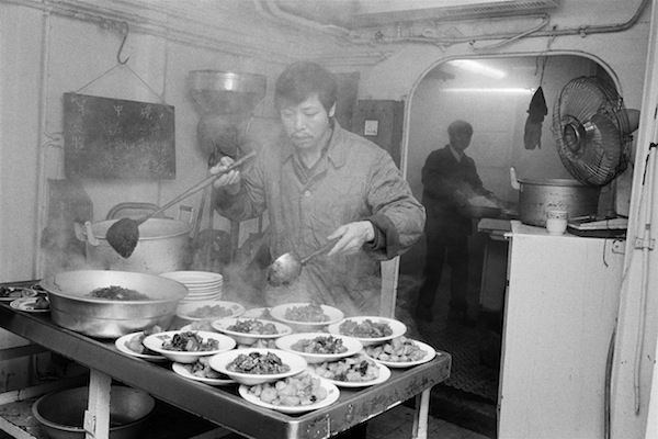 GB. England. Liverpool. Kitchen on Dade which is docked in Gladstone Dock. 1984. © Martin Parr